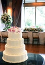 Frosted Wedding Cake with Pearls and Pink Flowers, Dinner Party Royalty Free Stock Photo