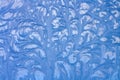 Frostwork. Beautiful frosty patterns on the glass. Royalty Free Stock Photo