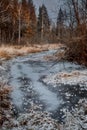 Frosty autumn landscape with cold river