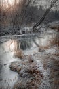 Frosty autumn landscape with cold river