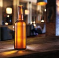 Frosty bottle of light beer on the bar counter. Royalty Free Stock Photo