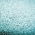 Frosty christmas pattern at a winter window glass Royalty Free Stock Photo