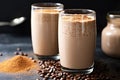 frosty coffee shake with a sprinkle of cocoa powder