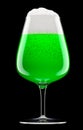 Frosty glass of draft green beer with bubble froth isolated on black background.