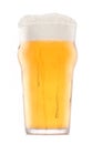 Frosty glass of fresh light beer with bubble froth isolated on white background. Royalty Free Stock Photo