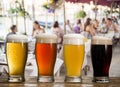 Frosty glass of light beer on the bar counter in the open-air cafe Royalty Free Stock Photo