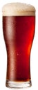 Frosty glass of red beer isolated on a white