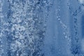 Frosty glass with a silvery blue pattern Royalty Free Stock Photo