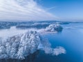 Frosty island in the blue lake, cold winter morning picture