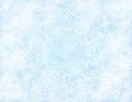 Frosty mystic abstract mandala blue background.