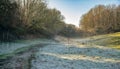 Frosty morning with stream and mist, Cotswolds, UK Royalty Free Stock Photo