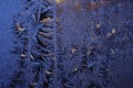 The frosty natural pattern on the cold winter windowpane Royalty Free Stock Photo