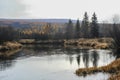 Frosty October morning in the taiga upper reaches of the Siberian river Royalty Free Stock Photo