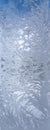 Frosty pattern on the window, glass in ice, winter background. Backdrop Royalty Free Stock Photo