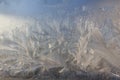 Frosty Pattern on the window in winter. Winter background. Aggregate state of water. Patterned background Royalty Free Stock Photo