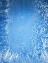 Frosty patterns on a edge of a frozen window. Royalty Free Stock Photo