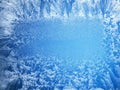 Frosty patterns on the a frozen window. Royalty Free Stock Photo