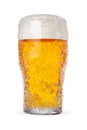Frosty pint glass of fresh cold beer with ice crystals isolated on white background Royalty Free Stock Photo