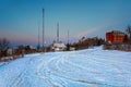 Frosty, snowy night with a blue sky at night in small heritage village Royalty Free Stock Photo