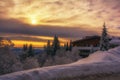 Frosty sunrise on Vitosha Mountain, Sofia, Bulgaria - beautiful winter landscape - first rays of sunlight over the fresh snow dust Royalty Free Stock Photo