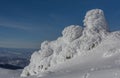 Frosty sunrise on Vitosha Mountain, Sofia, Bulgaria - beautiful winter landscape - first rays of sunlight over the fresh snow dust Royalty Free Stock Photo