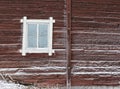 Frosty window of old log home