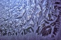 Frosty winter patterns on the windows. January.