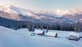 Frosty winter sunrise in Carpathian mountains with snow covered fir trees. Splendid outdoor panorama, Happy New Year celebration Royalty Free Stock Photo