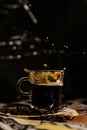 frothy cup of fresh coffee with splashes in the air Royalty Free Stock Photo