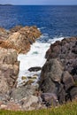 Frothy ocean water in the channel. Cape Breton, Nova Scotia, Canada Royalty Free Stock Photo