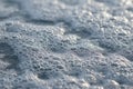 Frothy water with many bubbles reflecting sunlight Royalty Free Stock Photo