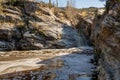 Frothy Waterfall Dumps Silty Water In The Desert Royalty Free Stock Photo