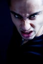 Frown of scary sinister evil vampire man Royalty Free Stock Photo