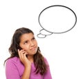 Frowning Hispanic Teen Aged Girl on Phone Royalty Free Stock Photo