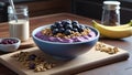 Frozen acai in a bowl served with granola and banana on rustic cutting board