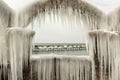 Frozen arches with huge icicles by the sea Royalty Free Stock Photo