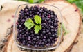 Frozen aronia in a bowl Royalty Free Stock Photo