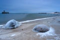 Frozen Baltic Sea beach in Babie DoÃây at sunset, Gdynia. Poland