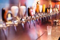 Frozen beer glass with beer taps with nobody. Selective focus. Alcohol concept. Vintage style. Beer craft. Bar table. Steel taps Royalty Free Stock Photo