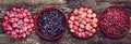 Frozen berries in bowls. Assorted frozen berries background. Fruit for tasty healthy desserts