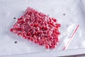 Frozen berries of viburnum in a sealed bag in the freezer Royalty Free Stock Photo