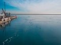 Frozen Blue Lake with Dock