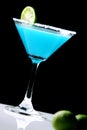 Frozen Blue Margarita Cocktail isolated on black