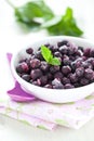 Frozen blueberries in bowl Royalty Free Stock Photo