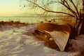 frozen boat in winter at sunrise Royalty Free Stock Photo