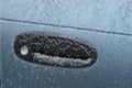 Frozen car door lock due to freezing rain