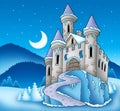 Frozen castle in winter landscape