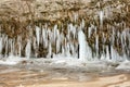 Frozen cave with big sharp icicles