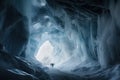 frozen cavern, with blurred motion of figures running through it