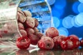 Frozen cherry in the glass reflecting on the surface with blurred background Royalty Free Stock Photo